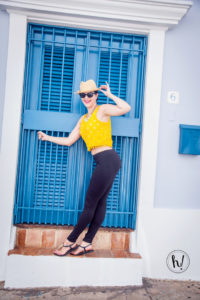 Kimmay wearing yellow top and black pants in Puerto Rico, Love Your Legs blog post